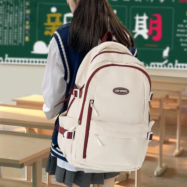 特步 简约休闲通勤大容量初高中大学生书包早八学院风旅行包轻便电脑包 涤纶 双肩包 大号 男女同款情侣款 卡其色/黑色