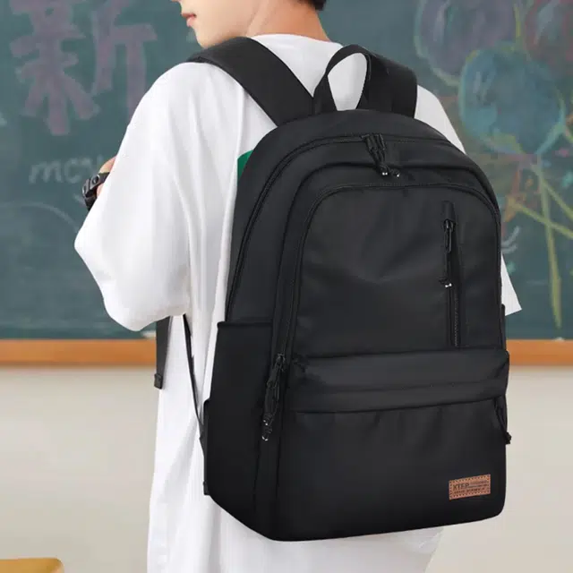 特步 初中生时尚潮流书包高中休闲百搭大容量学生轻便旅行背包 牛津纺 双肩包 常规 男女同款情侣款 黑色