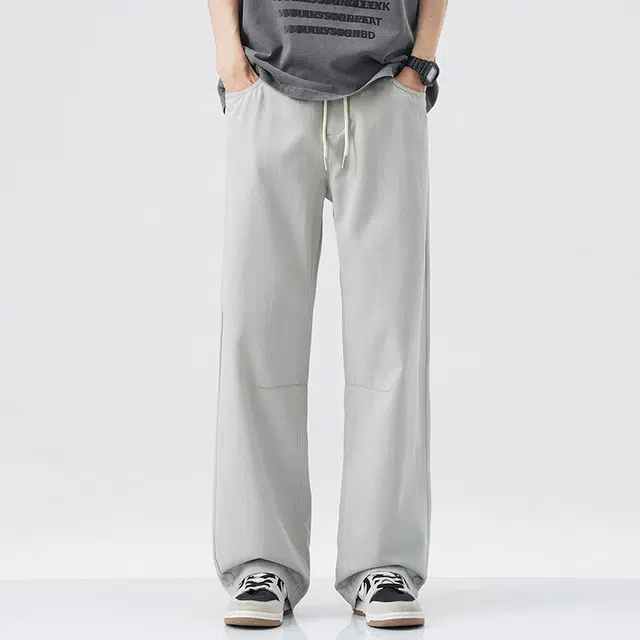 独驰 莱赛尔天丝棉凉感透气弯刀裤子夏季休闲裤 男女同款