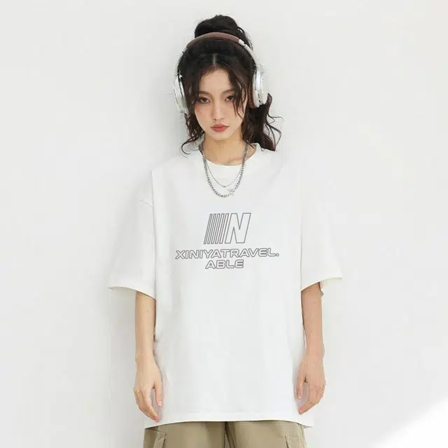 XINIYA TRAVEL LOGOT
