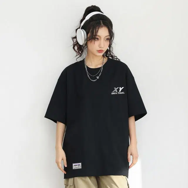 XINIYA TRAVEL LOGOT