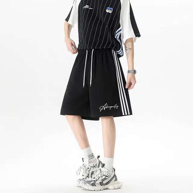 红蜻蜓 纯色字母美式高街复古设计感条纹拼接撞色品牌经典高级舒适宽松百搭日常通勤潮流时尚简约系带五分休闲短裤 男女同款