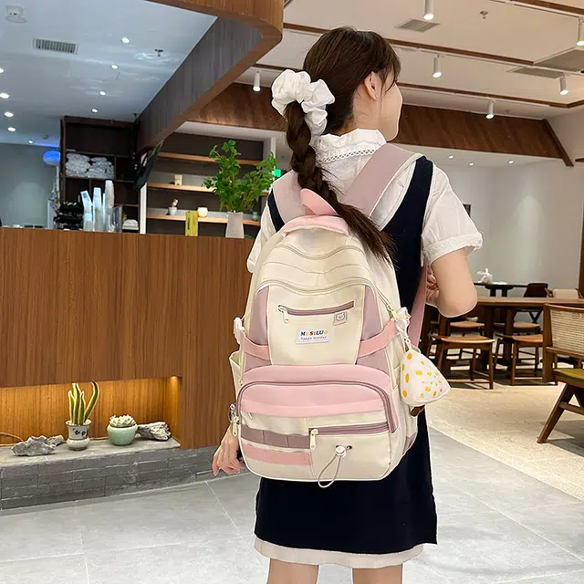 捷朗仕 大容量美式大学生高中生书包撞色可爱拼接图案潮流时尚背包 尼龙 双肩包 男女同款情侣款 粉紫色/蓝绿色/黄棕色/黑色