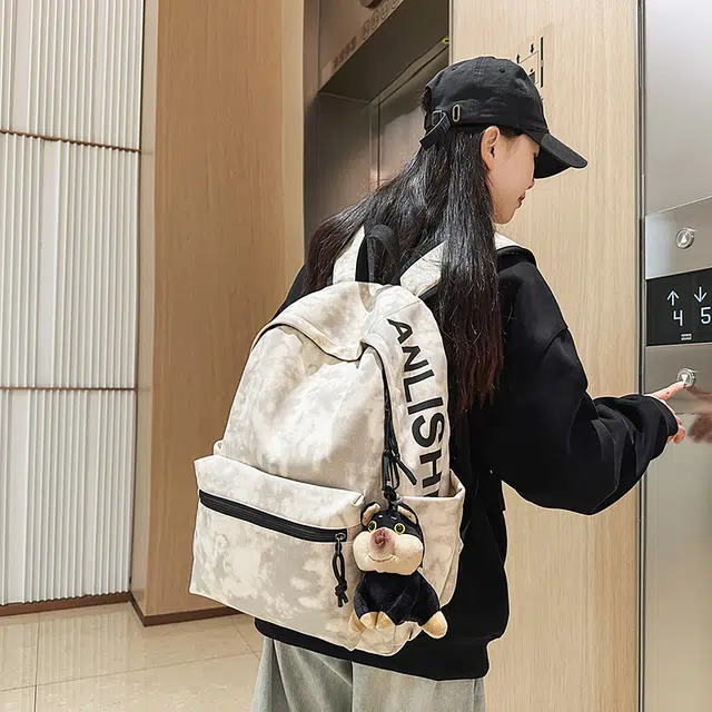 捷朗仕 高级质感涂鸦潮流简约通勤大学生休闲上学高中大学生背包 尼龙 双肩包 男女同款情侣款 米白色/黑色/绿色/红色