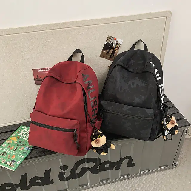 捷朗仕 高级质感涂鸦潮流简约通勤大学生休闲上学高中大学生背包 尼龙 双肩包 男女同款情侣款 米白色/黑色/绿色/红色
