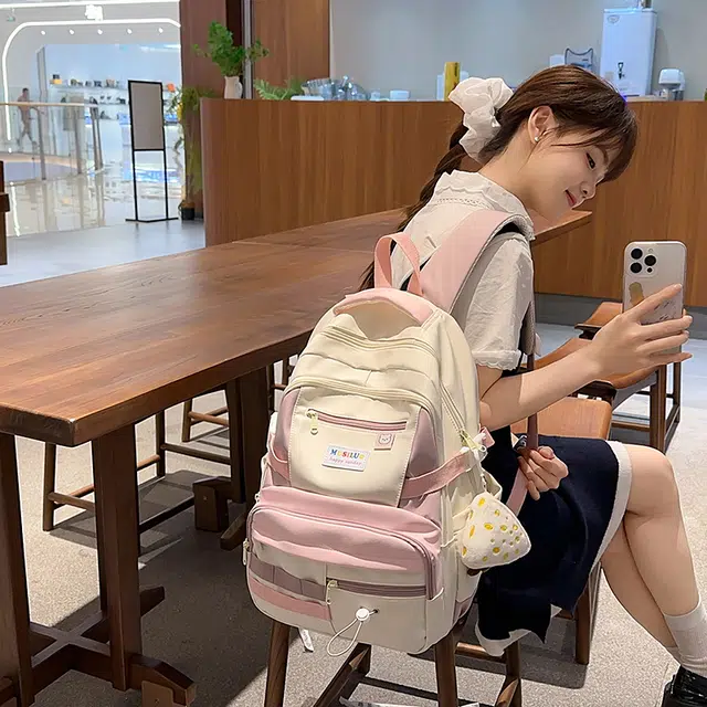 捷朗仕 大容量美式大学生高中生书包撞色可爱拼接图案潮流时尚背包 尼龙 双肩包 男女同款情侣款 粉紫色/蓝绿色/黄棕色/黑色