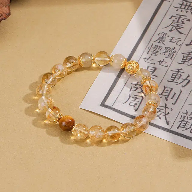 鸣钻国际 【财运亨通】八方来财日进斗金 圆润透亮高品质 事业开挂吸金体质 玄学国潮 时尚单品 #好运天然 黄水晶 手串 男女同款情侣款