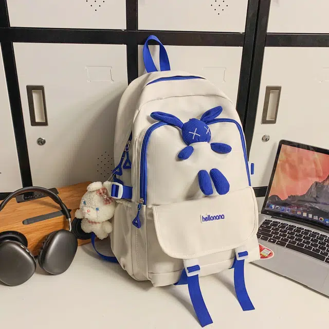 米囹 初中高中兔子装饰酷 通勤个性纯色耐看 男女同款 轻盈 双肩包 常规 白色/黑色/蓝色/粉色