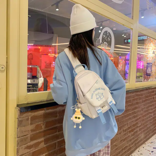 米囹 韩版时尚质地耐磨 可爱兔子图案运动复古  轻盈 斜跨包 中号 白色加公仔/黑色加公仔/粉红色加公仔/紫色加公仔/绿色加公仔