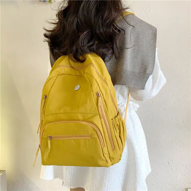 米囹 耐看百搭 尼龙布简约素雅酷舒适 亲肤日常 男女同款 轻盈 双肩包 常规 米白色/浅灰色/黑色/桔红色/黄色/卡其色/军绿色/浅蓝色