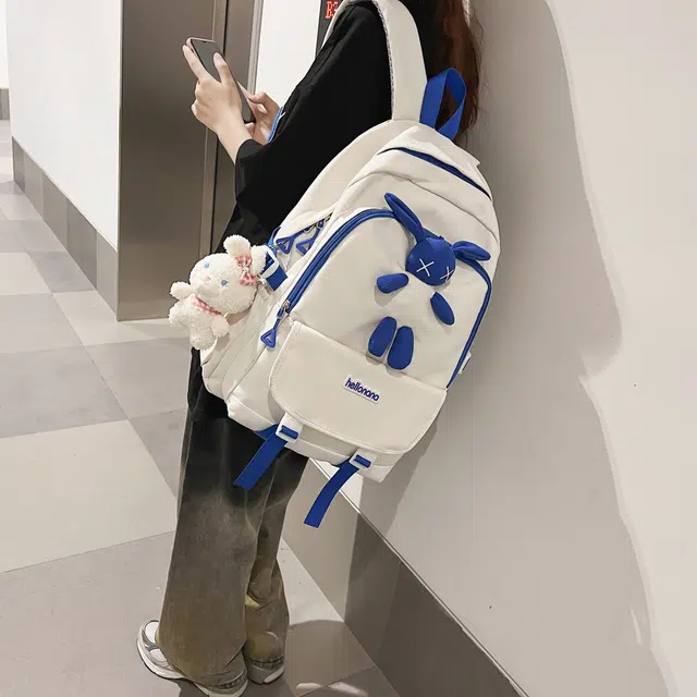 米囹 初中高中兔子装饰酷 通勤个性纯色耐看 男女同款 轻盈 双肩包 常规 白色/黑色/蓝色/粉色