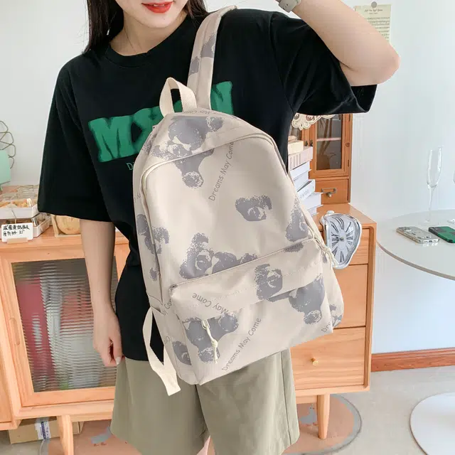 米囹 别样小熊印花街头视觉潮好看 拉链设计可爱行走 男女同款 轻盈 双肩包 白色/黑色/粉红色/绿色