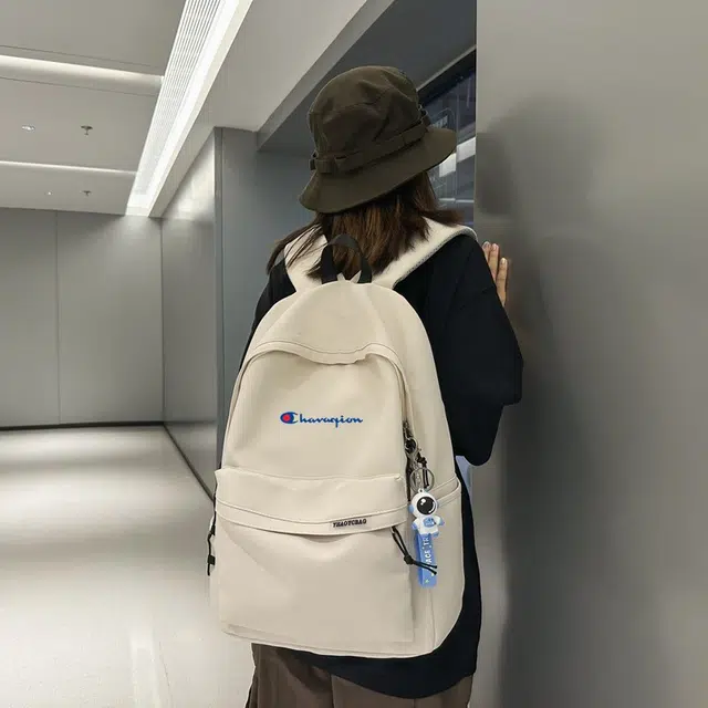 米囹 都市潮搭 经典元素初中高中大容量 学生 男女同款 轻盈 双肩包 黑色/白色