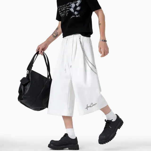 巴塞罗那足球俱乐部 复古高街时尚金属链绳装饰宽松垂感过膝七分裤无性别主义简约基础纯色运动百搭松紧腰休闲短裤 男女同款