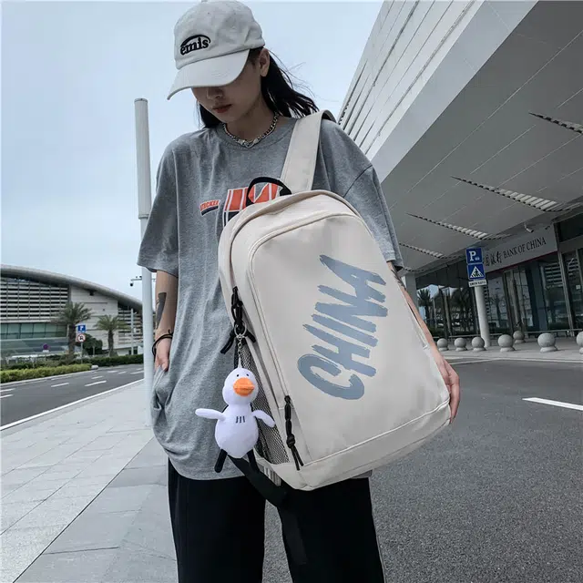 尊梵 日系中性风休闲简约学生上课通勤时尚百搭 尼龙 双肩包 男女同款情侣款 白色/黑色