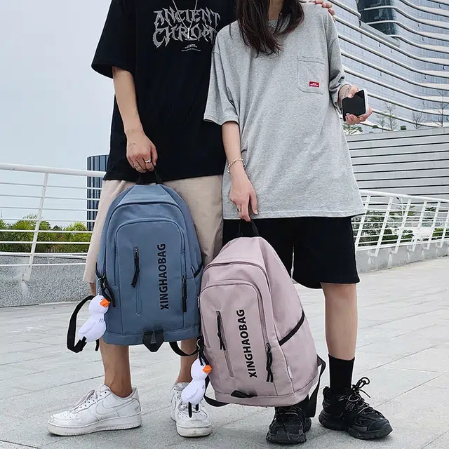 尊梵 休闲简约百搭通勤背包学院风户外 尼龙 双肩包 男女同款情侣款 白色/黑色/紫色/绿色/蓝色/粉色