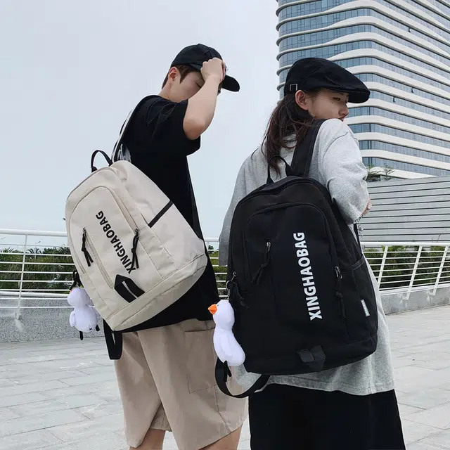 尊梵 休闲简约百搭通勤背包学院风户外 尼龙 双肩包 男女同款情侣款 白色/黑色/紫色/绿色/蓝色/粉色