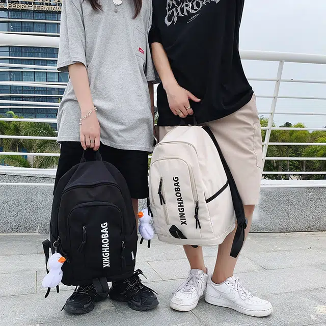 尊梵 休闲简约百搭通勤背包学院风户外 尼龙 双肩包 男女同款情侣款 白色/黑色/紫色/绿色/蓝色/粉色