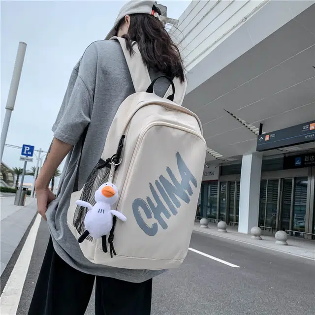 尊梵 日系中性风休闲简约学生上课通勤时尚百搭 尼龙 双肩包 男女同款情侣款 白色/黑色