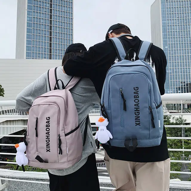 尊梵 休闲简约百搭通勤背包学院风户外 尼龙 双肩包 男女同款情侣款 白色/黑色/紫色/绿色/蓝色/粉色