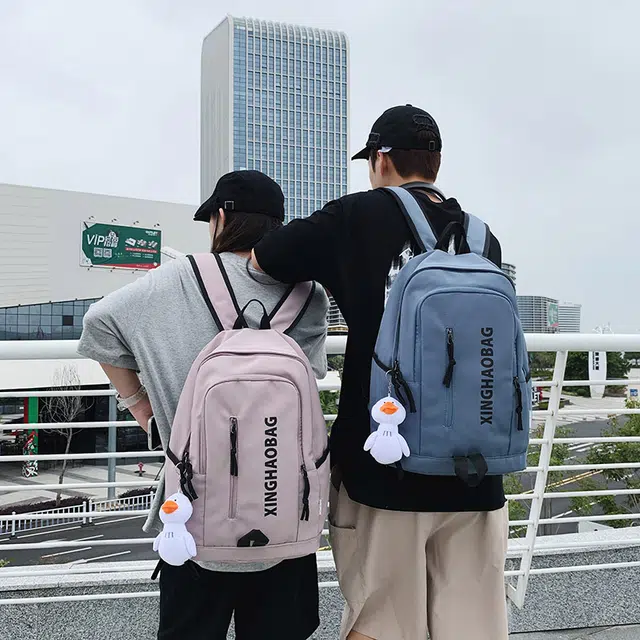 尊梵 休闲简约百搭通勤背包学院风户外 尼龙 双肩包 男女同款情侣款 白色/黑色/紫色/绿色/蓝色/粉色