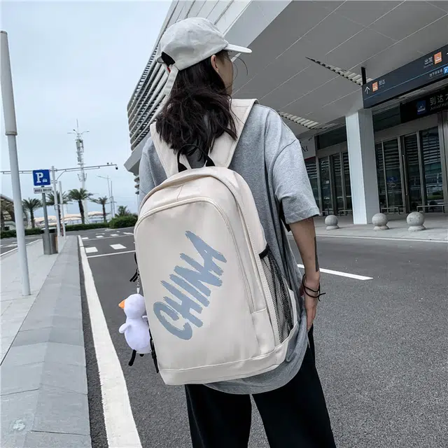 尊梵 日系中性风休闲简约学生上课通勤时尚百搭 尼龙 双肩包 男女同款情侣款 白色/黑色