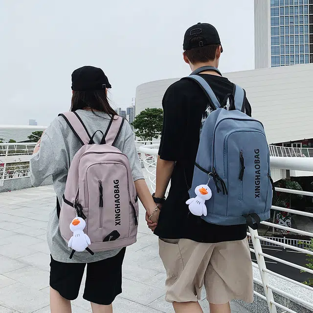 尊梵 休闲简约百搭通勤背包学院风户外 尼龙 双肩包 男女同款情侣款 白色/黑色/紫色/绿色/蓝色/粉色