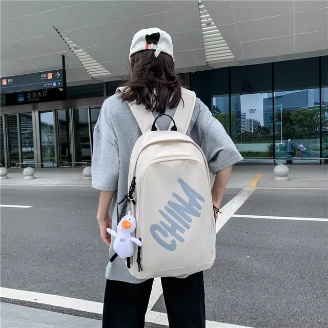 尊梵 日系中性风休闲简约学生上课通勤时尚百搭 尼龙 双肩包 男女同款情侣款 白色/黑色