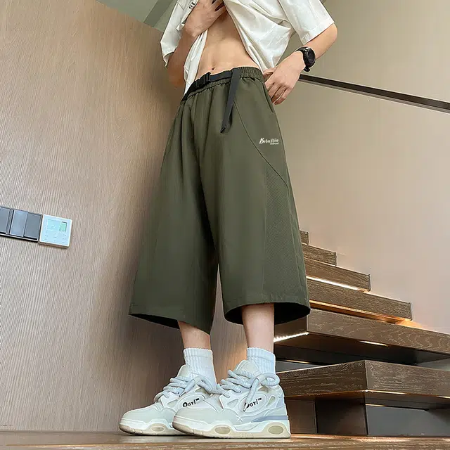 普鲁士多特蒙德 廓形解构透气孔设计宽松舒适自带腰带松紧中腰百搭日常通勤慵懒风高街七分休闲短裤 男女同款
