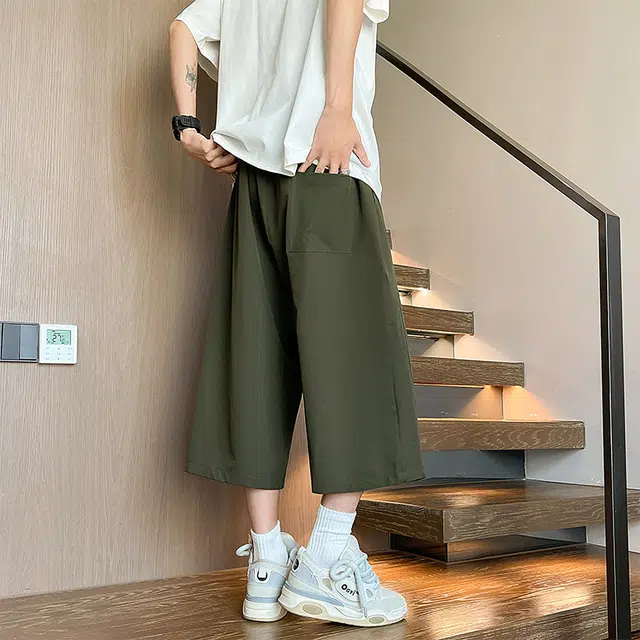 普鲁士多特蒙德 廓形解构透气孔设计宽松舒适自带腰带松紧中腰百搭日常通勤慵懒风高街七分休闲短裤 男女同款