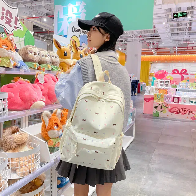 蔻蒂熊 高颜值日系可爱时尚简约小狗包学生大容量书包高级感小众百搭款轻便休闲背包 涤纶 双肩包 常规 青少年 白色