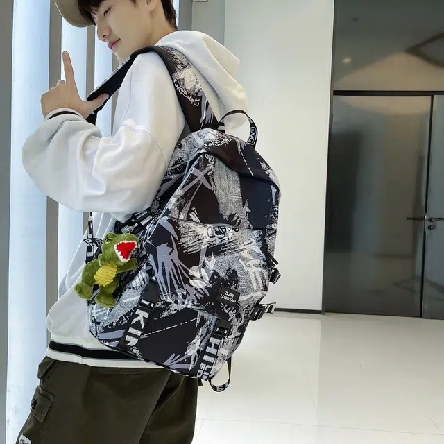 蔻蒂熊  高中生书包男大容量结实耐用防水耐脏高颜值轻便实用舒适透气 涤纶 双肩包 常规 青少年 黑色/红色/绿色/蓝色