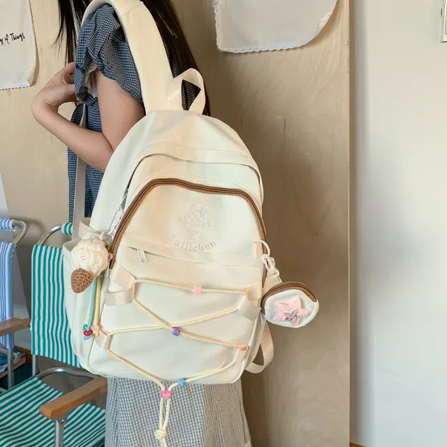 蔻蒂熊  书包女高颜值男生高中百搭初中生大容量少女轻便校园时尚简约可爱 涤纶 双肩包 常规 青少年 白色/粉色/黄色/蓝色