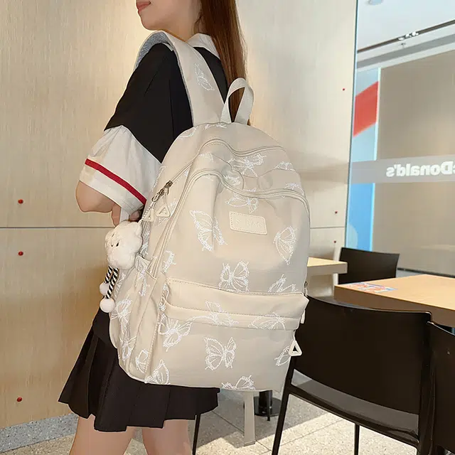 蔻蒂熊 大容量初中生书包女韩版原宿高中大学生背包女高颜值旅行休闲百搭轻便简约 涤纶 双肩包 常规 青少年 米白色/黑色/绿色/灰蓝色