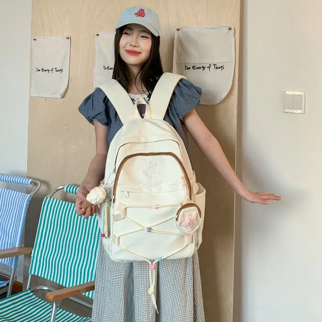 蔻蒂熊  书包女高颜值男生高中百搭初中生大容量少女轻便校园时尚简约可爱 涤纶 双肩包 常规 青少年 白色/粉色/黄色/蓝色