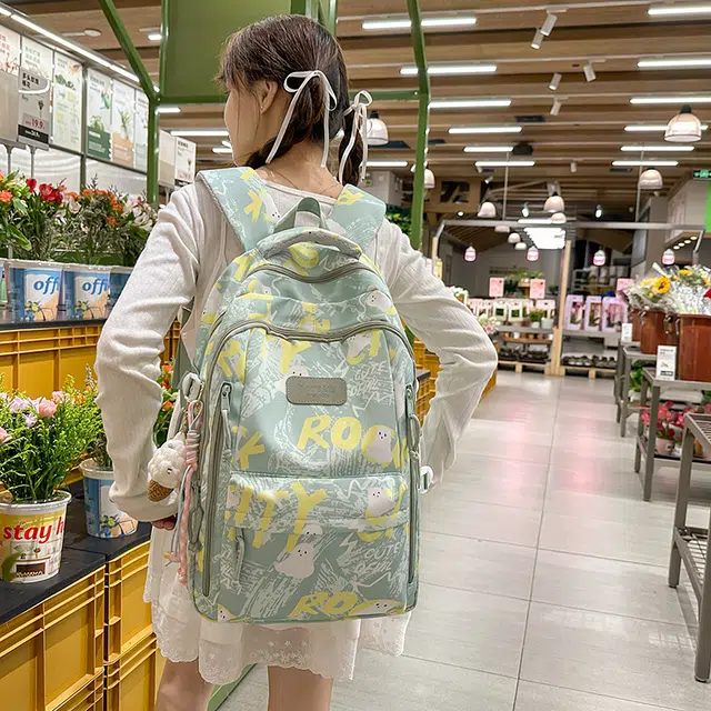蔻蒂熊 涂鸦韩版印花书包初中高中中学生睿营大容量高颜值可爱潮流 涤纶 双肩包 常规 青少年 白色/黑色/紫色/绿色/粉色