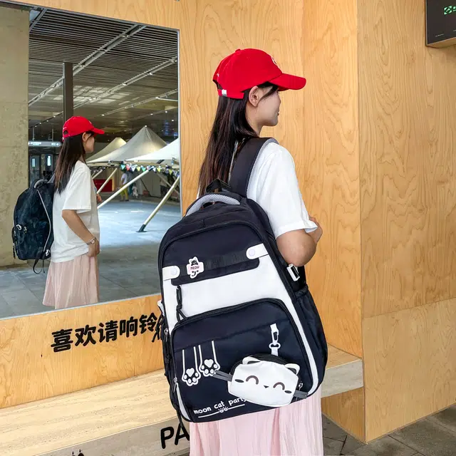 蔻蒂熊 书包女生初中生超大容量中学生高中轻便减负背包高颜值女孩休闲百搭 涤纶 双肩包 黑色/紫色/粉色/红色/棕色