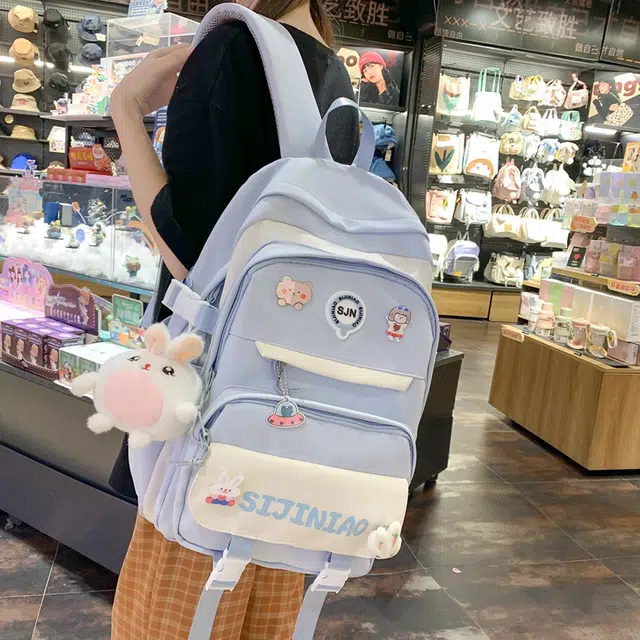 蔻蒂熊 书包初中女生大容量中学生少女简约小学生三到六年级背包高颜值 涤纶 双肩包 常规