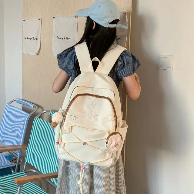 蔻蒂熊  书包女高颜值男生高中百搭初中生大容量少女轻便校园时尚简约可爱 涤纶 双肩包 常规 青少年 白色/粉色/黄色/蓝色