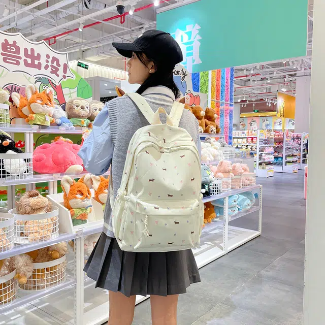 蔻蒂熊 高颜值日系可爱时尚简约小狗包学生大容量书包高级感小众百搭款轻便休闲背包 涤纶 双肩包 常规 青少年 白色