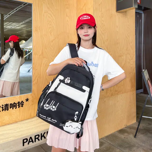 蔻蒂熊 书包女生初中生超大容量中学生高中轻便减负背包高颜值女孩休闲百搭 涤纶 双肩包 黑色/紫色/粉色/红色/棕色