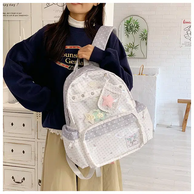 蔻蒂熊 高颜值日系可爱斑点透明痛包休闲百搭二次元少女书包小型背包旅行 尼龙布 双肩包 白色    黑色    粉色