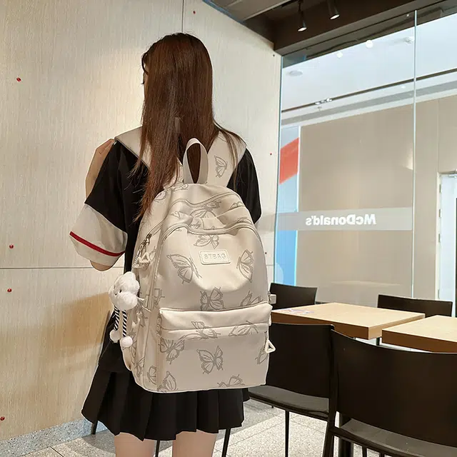 蔻蒂熊 大容量初中生书包女韩版原宿高中大学生背包女高颜值旅行休闲百搭轻便简约 涤纶 双肩包 常规 青少年 米白色/黑色/绿色/灰蓝色