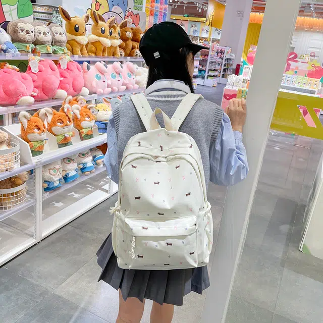 蔻蒂熊 高颜值日系可爱时尚简约小狗包学生大容量书包高级感小众百搭款轻便休闲背包 涤纶 双肩包 常规 青少年 白色