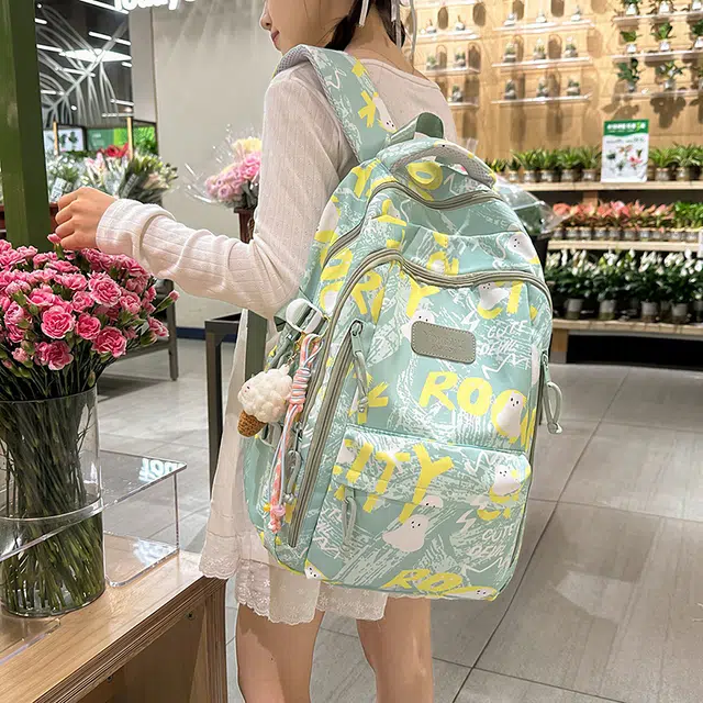 蔻蒂熊 涂鸦韩版印花书包初中高中中学生睿营大容量高颜值可爱潮流 涤纶 双肩包 常规 青少年 白色/黑色/紫色/绿色/粉色