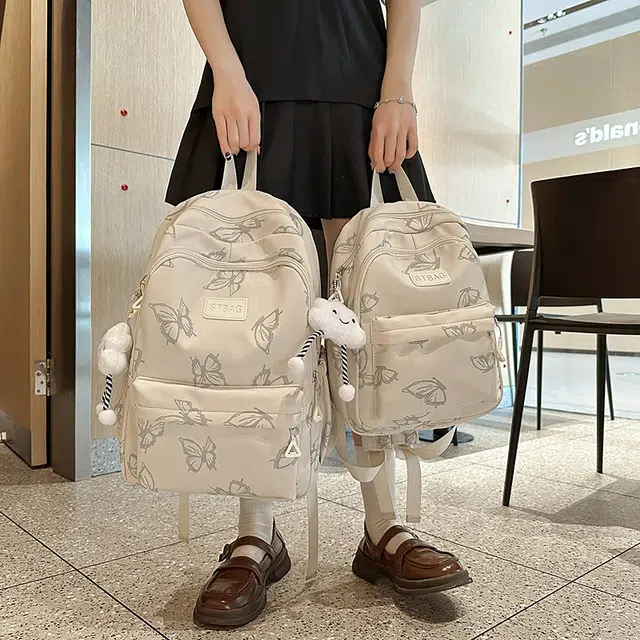 蔻蒂熊 大容量初中生书包女韩版原宿高中大学生背包女高颜值旅行休闲百搭轻便简约 涤纶 双肩包 常规 青少年 米白色/黑色/绿色/灰蓝色