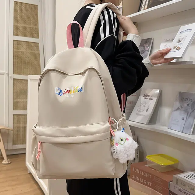 蔻蒂熊 大容量高颜值休闲百搭旅游轻便简约学院风耐脏时尚潮流 涤纶 双肩包 常规 青少年 白色/黑色/卡其色/蓝色