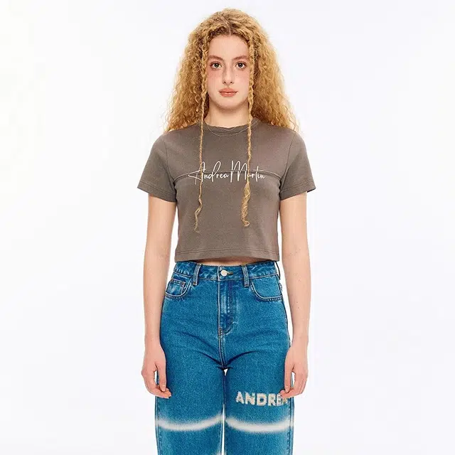 ANDREA MARTIN logo T