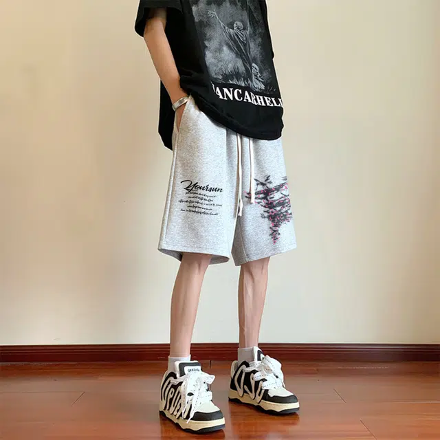 宜而爽 美式复古高街创意印花涂鸦闪电龙卷风字母印花宽松舒适透气松紧系带直筒阔腿动沙滩裤运动基础百搭五分休闲短裤 男女同款