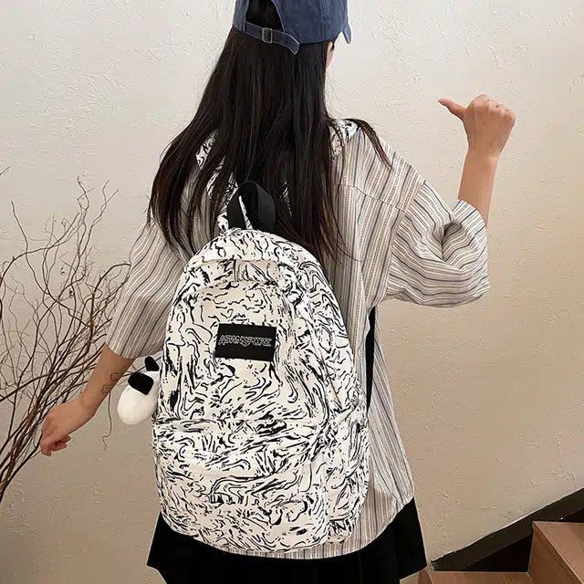 草丛喵喵喵 大容量 简约潮 街头时尚学院风学生书包旅游休闲运动健身 尼龙 双肩包 常规 男女同款情侣款 白色/黑色/红色/浅蓝色